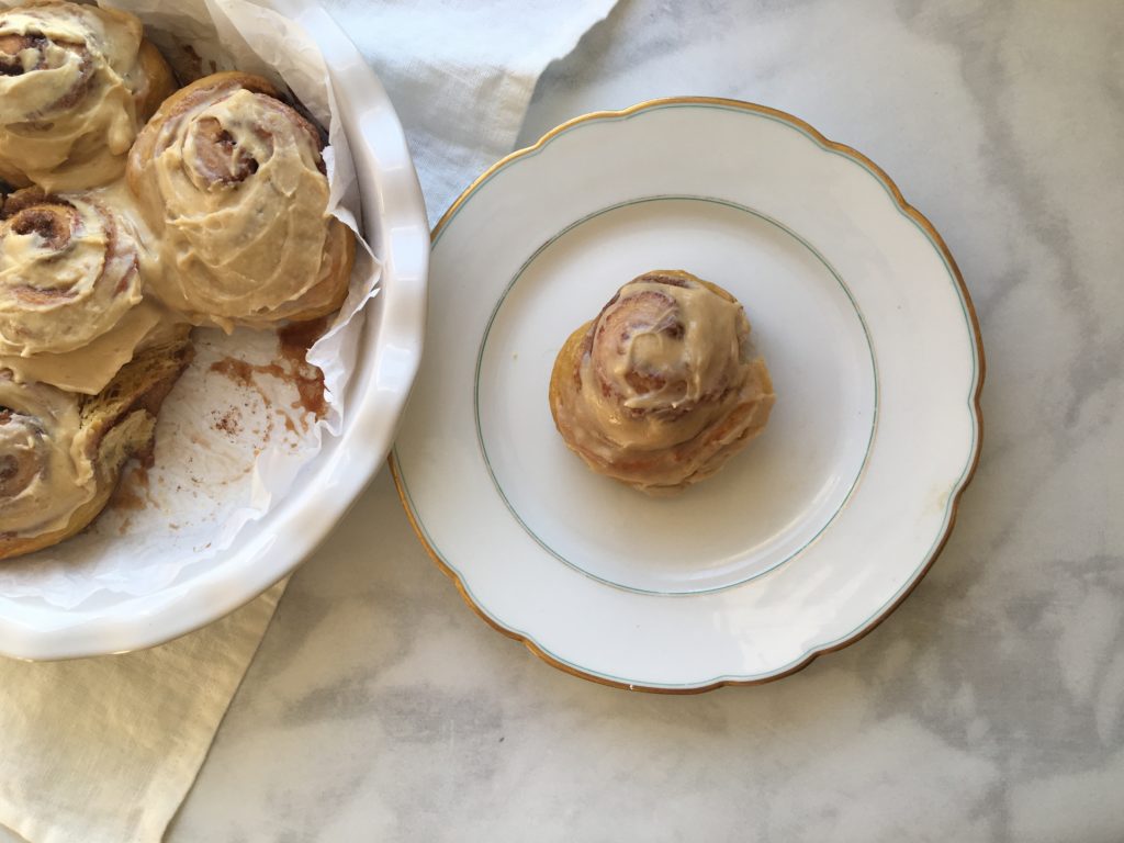 carrot cake cinnamon rolls, maple-tahini cream cheese icing.