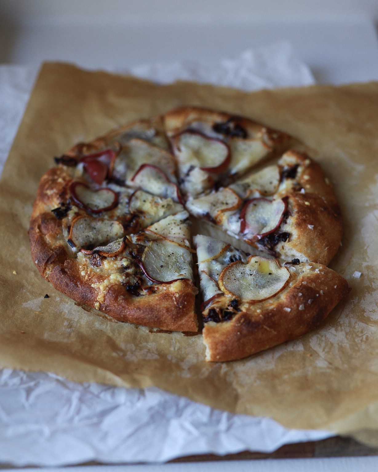 Pear, Manchego, and Caramelized Onion Pizza with Sourdough Discard Crust Pastry and Prose